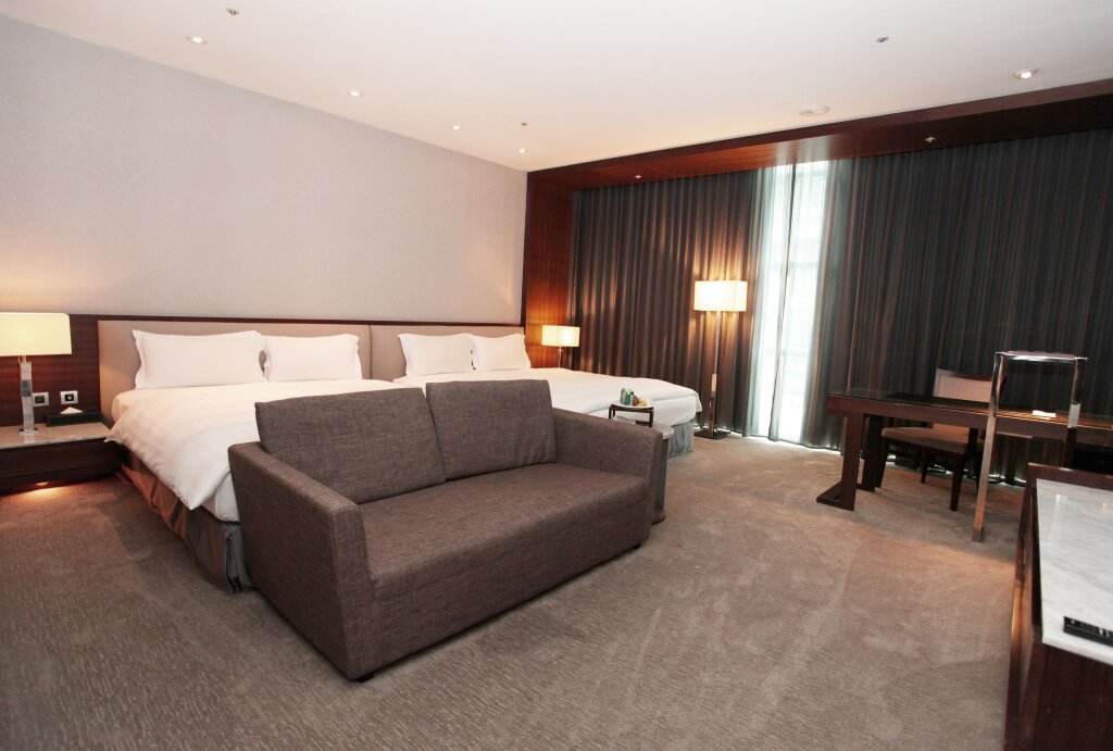 Deluxe quadruple chambre Taipung Suites
