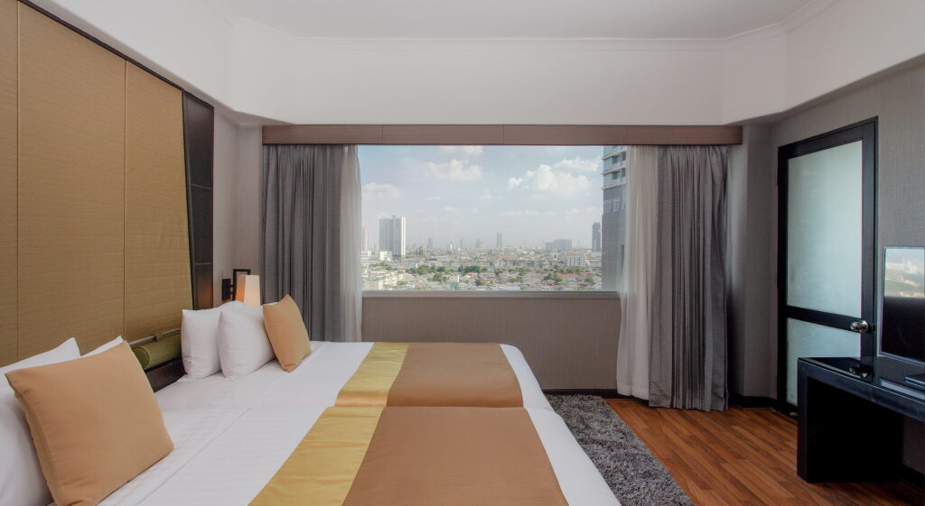 Четырёхместный люкс Thai Deluxe с 2 комнатами Ramada Plaza by Wyndham Bangkok Menam Riverside