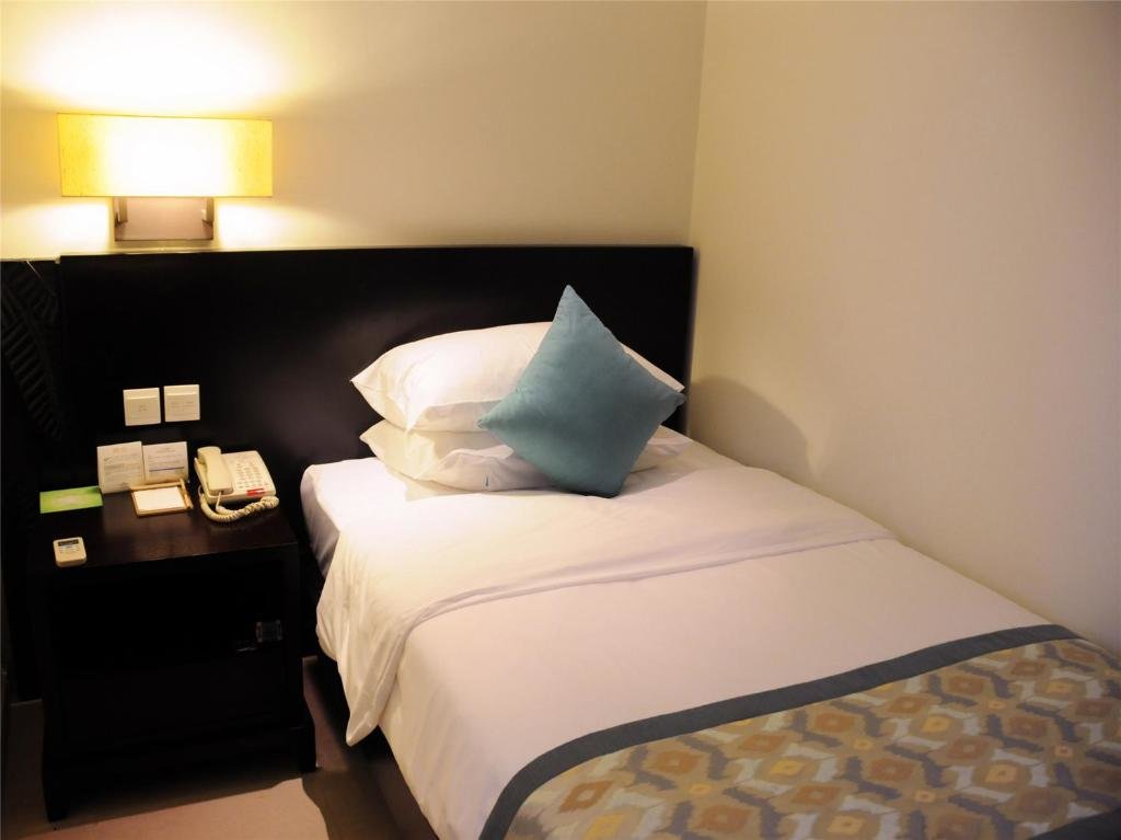 Трёхместный семейный люкс с 2 комнатами Howard Johnson Resort Sanya Bay