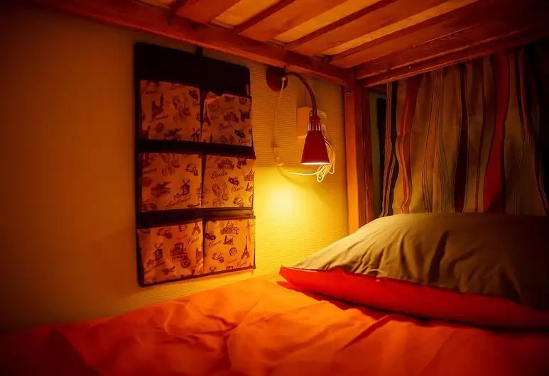 Bed in Dorm Club puteshestvennikov
