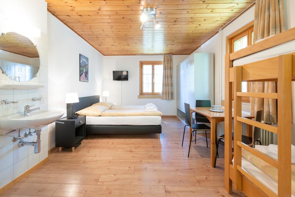 Кровать в общем номере Hostel by Randolins
