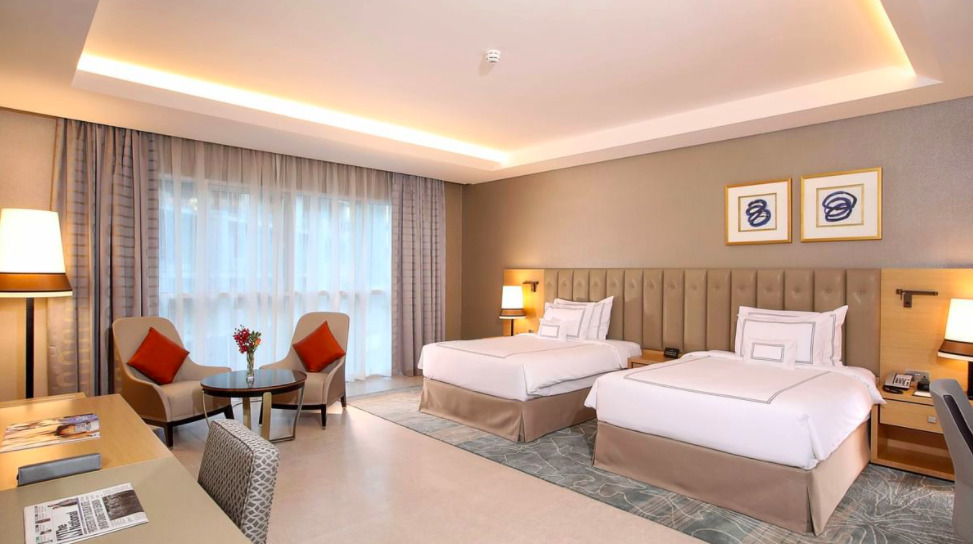 Premium Quadruple room Grand Cosmopolitan Hotel
