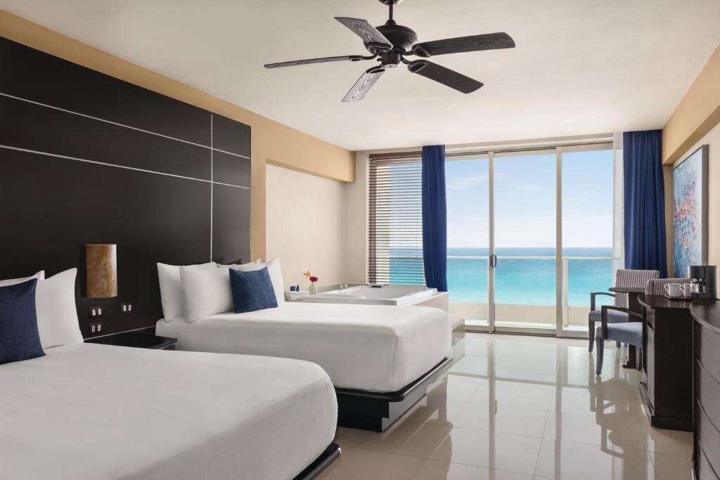 Четырёхместный люкс Premium Seadust Cancun Family Resort