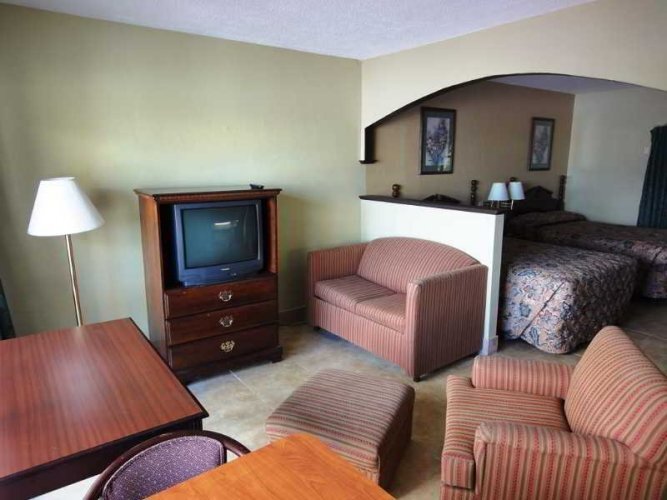 Кровать в общем номере Oceans Beach Resort & Suites