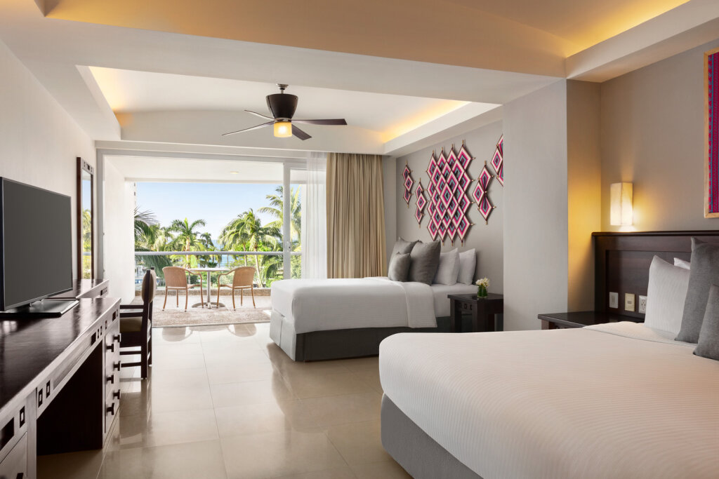 Quadruple Junior Suite with partial ocean view Wyndham Alltra Vallarta, All-Inclusive Resort