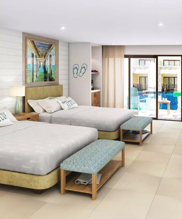 Junior suite Paradise quadrupla Margaritaville Island Reserve Riviera Cancún - An All-Inclusive Experience for All