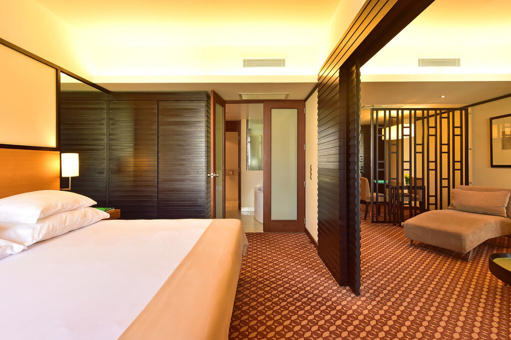 Suite doble con balcón y con vista parcial al mar Pestana Casino Park Ocean and SPA Hotel