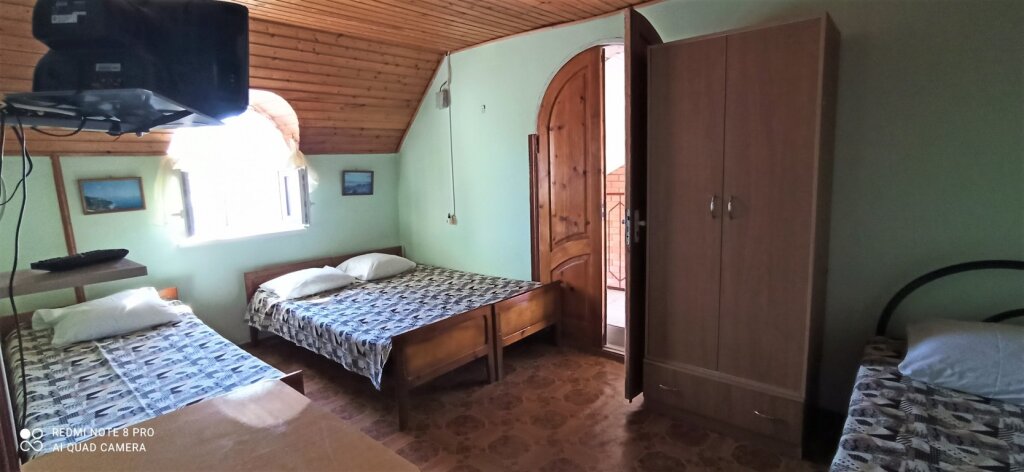 Économie quadruple chambre Yuzhnyiy Dom Guest House