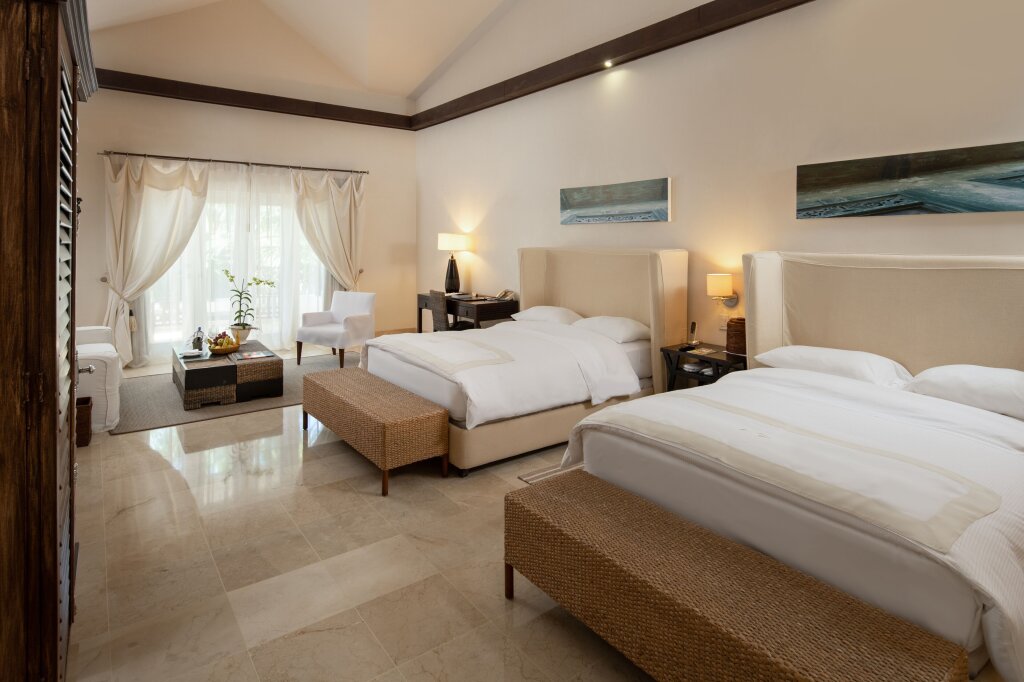 Superior Quadruple Junior Suite with tropical view Casa Colonial Beach & Spa