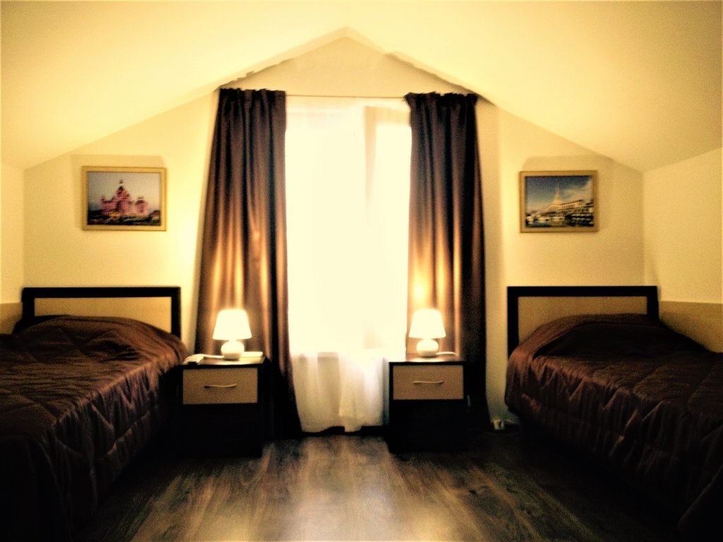 Économie double chambre Mini-hotel Utomlennye Solntsem