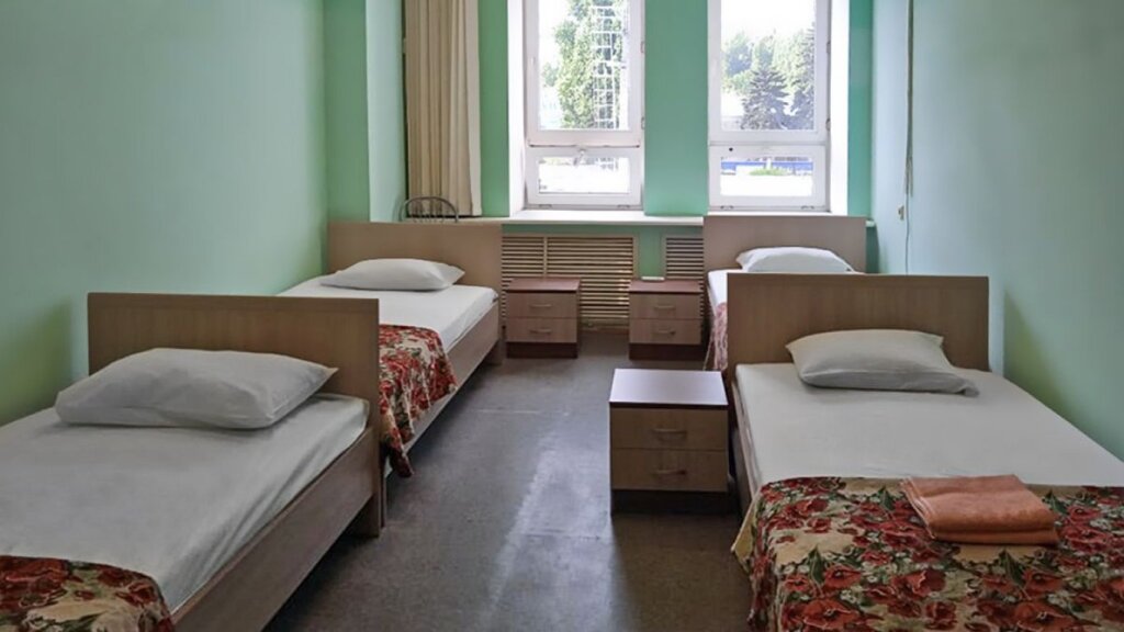 Кровать в общем номере Smart Hotel КДО Саратов