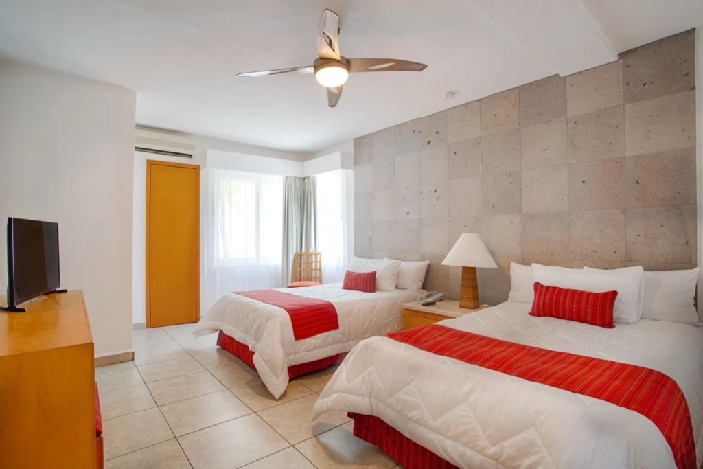 Suite cuádruple 1 dormitorio frente al océano Suites Family Emotion By Marival Resort All Inclus