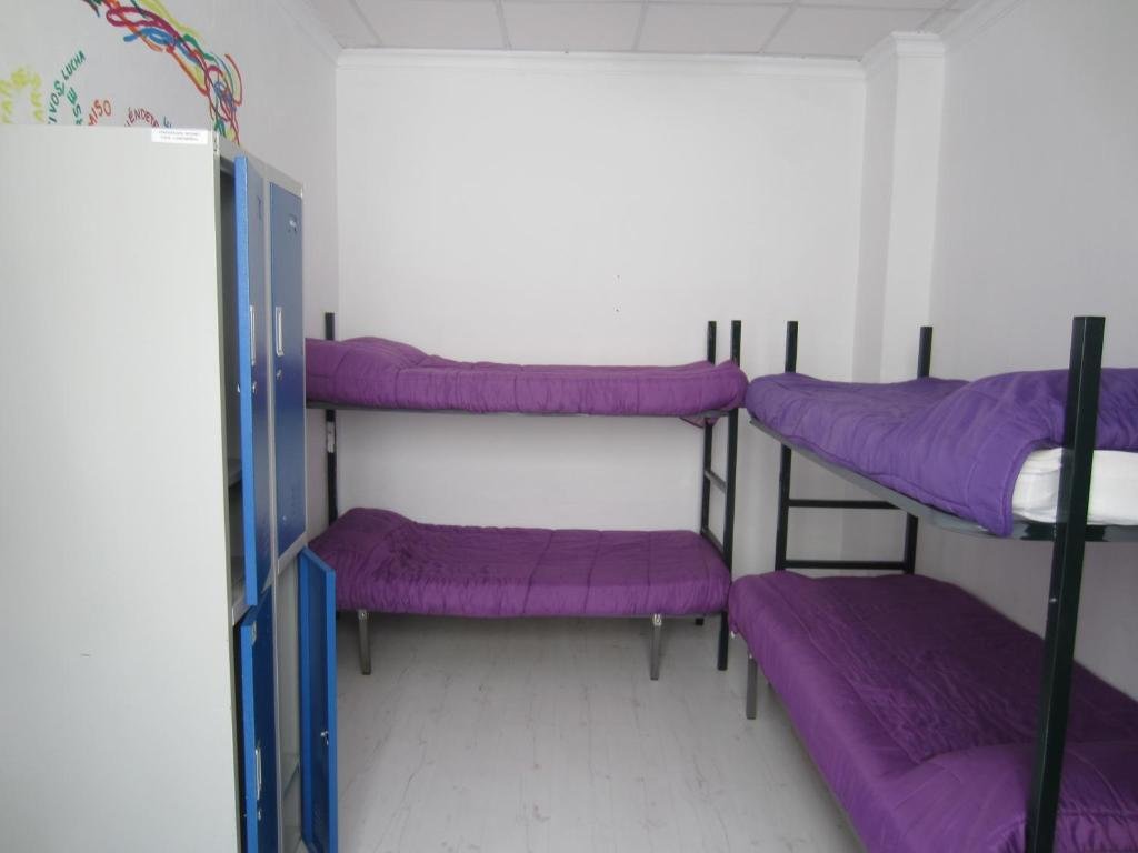 Bett im Wohnheim Malaga City Suites