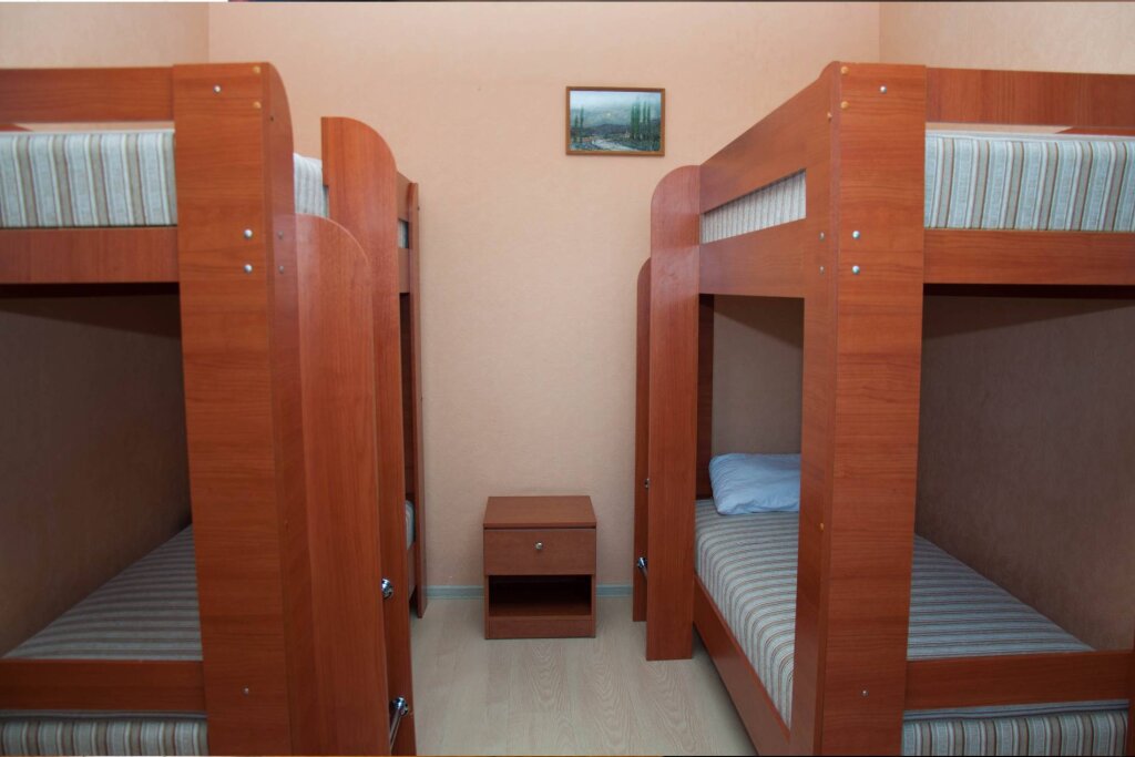 Кровать в общем номере Гостиница Урал