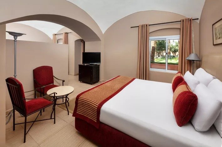 Double Junior Suite with pool view Jaz Makadi Oasis Resort
