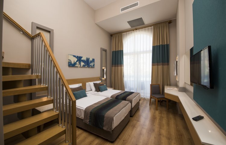 Standard quadruple chambre duplex Palm World Side Resort & SPA