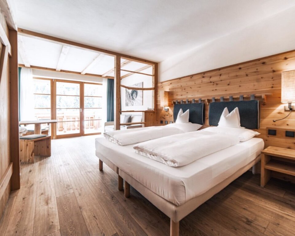 Четырёхместный Dolomit люкс Dolomites Living Hotel Tirler