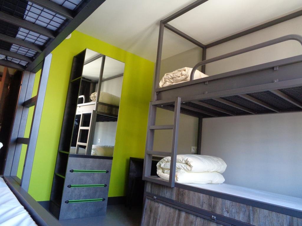 Кровать в общем номере Brxxl 5 City Centre Hostel