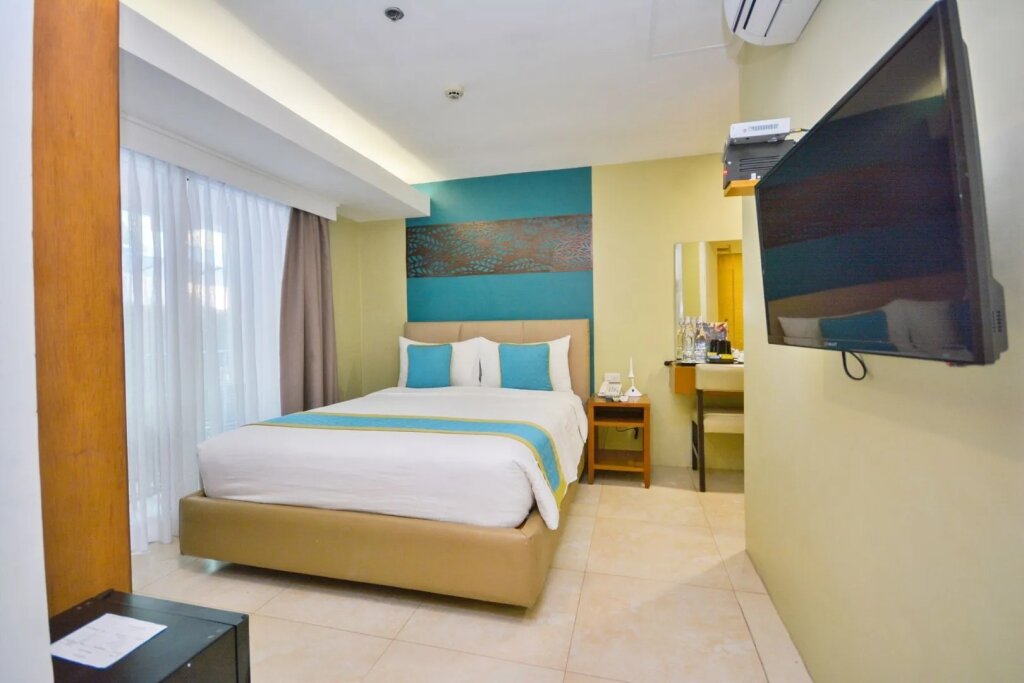 Junior suite familiare con vista sulla piscina Boracay Haven Resort